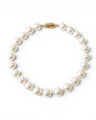 White freshwater pearl bracelet with a gold clasp