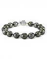 Prestige Pearl bracelet featuring 9-10mm dark baroque Tahitian pearls with high luster and a decorative silver clasp.