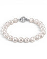 Prestige Pearl 7.5-8mm white Akoya pearl bracelet with a round corrugated clasp on a white background.