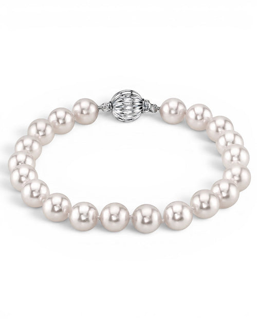 Prestige Pearl hand-knotted white Akoya pearl bracelet with a round corrugated clasp on a white background.