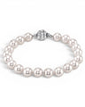 Prestige Pearl hand-knotted white Akoya pearl bracelet with a round corrugated clasp on a white background.