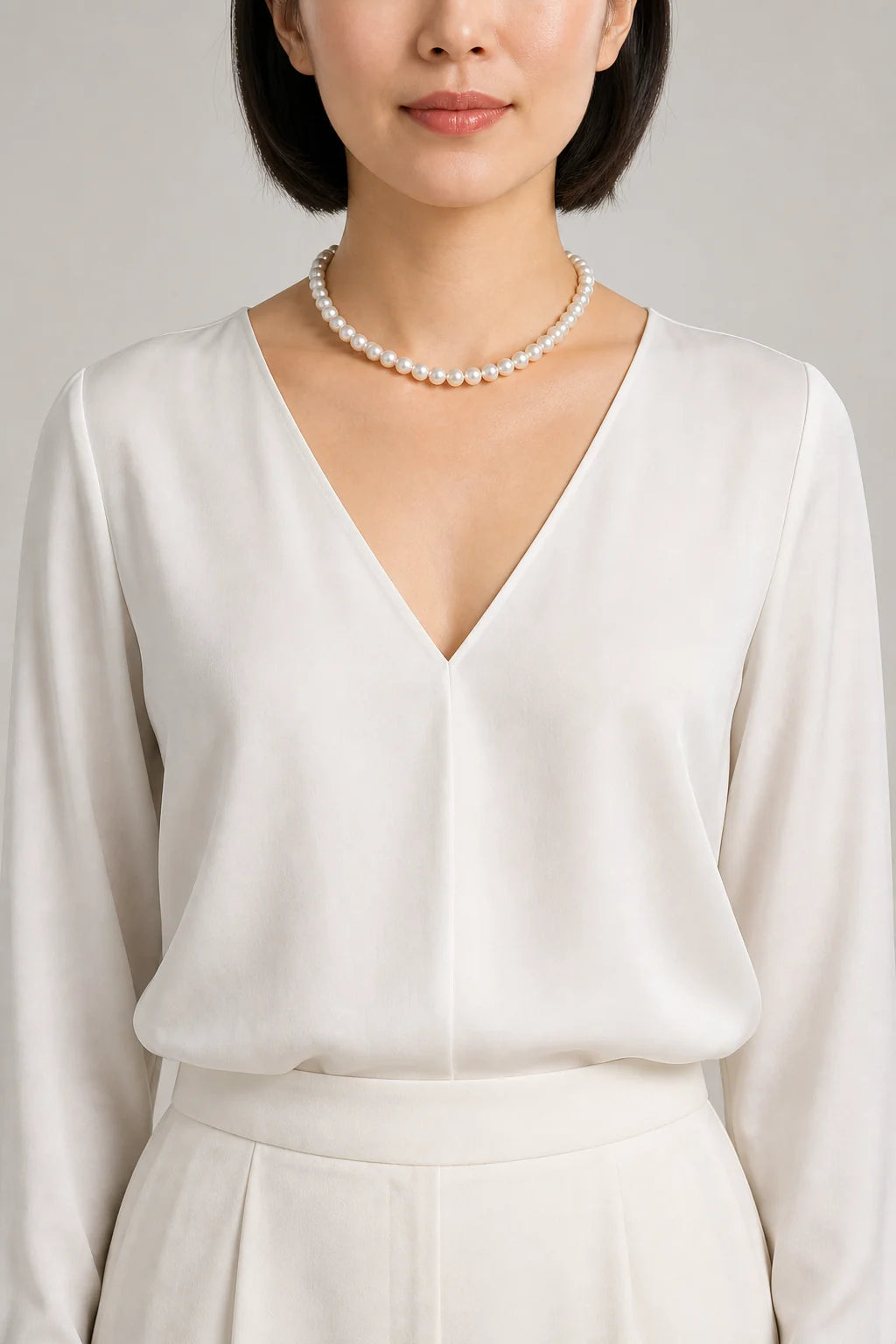 16-inch Akoya pearl necklace shown on a model